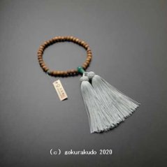 数珠 女性用 主玉白檀7mm、(親・２天・ボサ)翡翠(アベン)入り 正絹頭付房ひわ色の画像