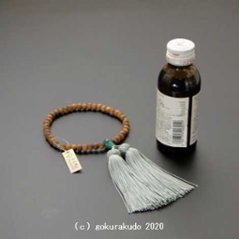 数珠 女性用 主玉白檀7mm、(親・２天・ボサ)翡翠(アベン)入り 正絹頭付房ひわ色画像