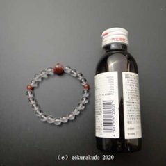 数珠ブレス 親・2天メノウ(親玉に般若心経彫り入り)、主玉透明水晶8mm、ピンクゴム通し画像