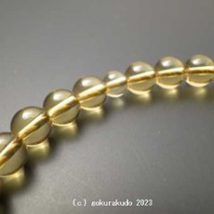 数珠 女性用 総黄水晶（主玉７ｍｍ） 正絹頭付き房画像