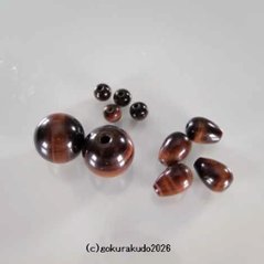 (数珠部品) 日蓮宗、尺２数珠用の(親・四天・つゆ)　赤虎目製の画像