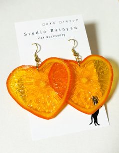 輪切りハートオレンジ*ピアスの画像