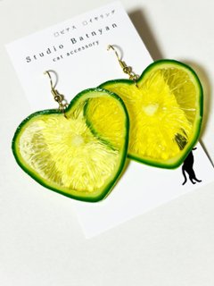 輪切りハートライム*ピアスの画像