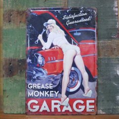 ピンナップガール アンティーク エンボスメタルプレート 【GREASE MONKEY GARAGE 】 ブリキ看板の画像